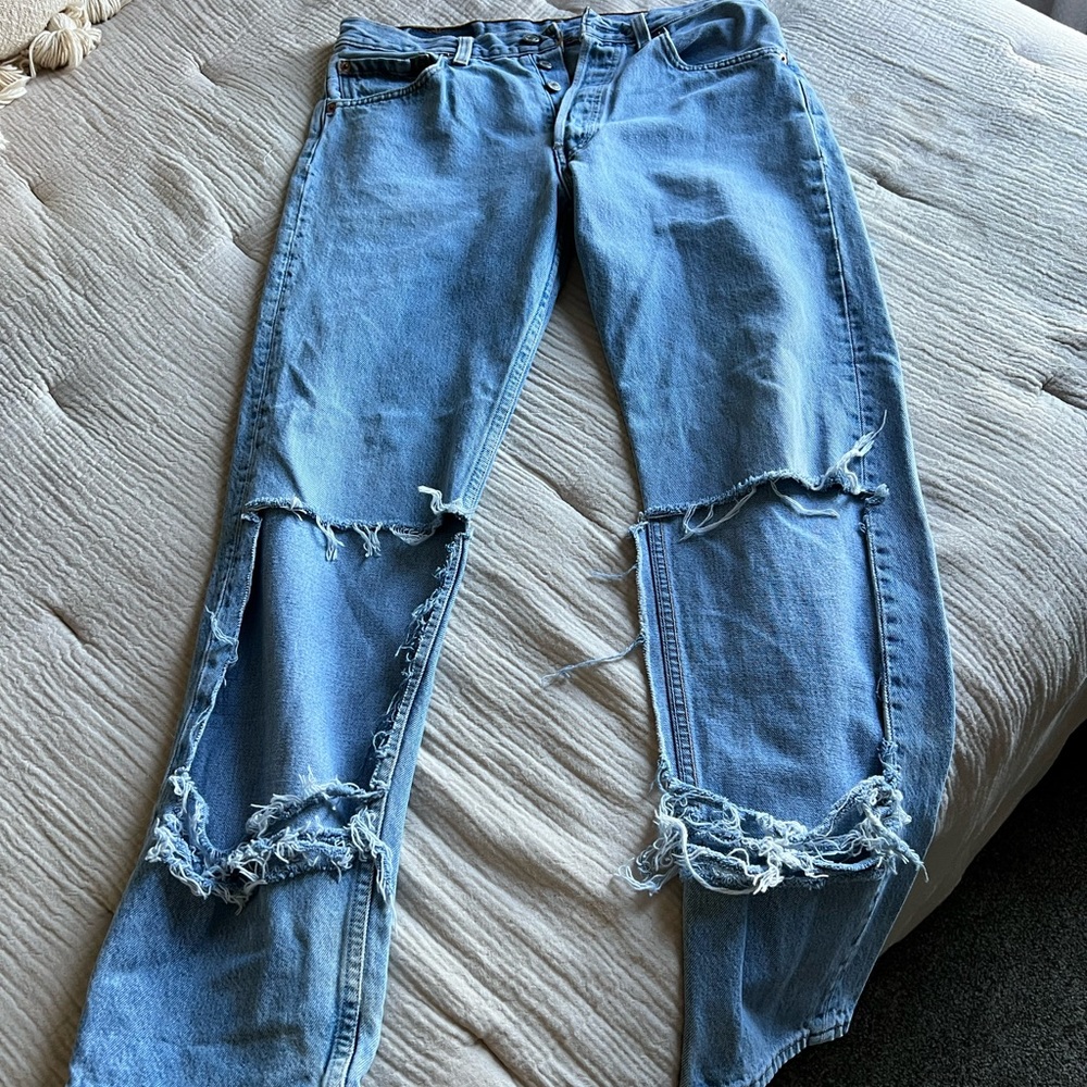 Vintage one of a kind custom Levi’s size 27 jeans. Worn once!